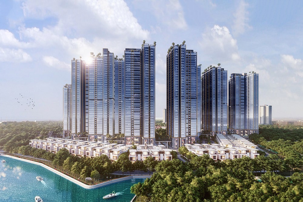 Toàn cảnh các tòa chung cư cao tầng trong dự án Sunshine Grand City, với thiết kế hiện đại, mặt kính xanh, nằm cạnh khu biệt thự thấp tầng và ven hồ nước xanh ngọc.